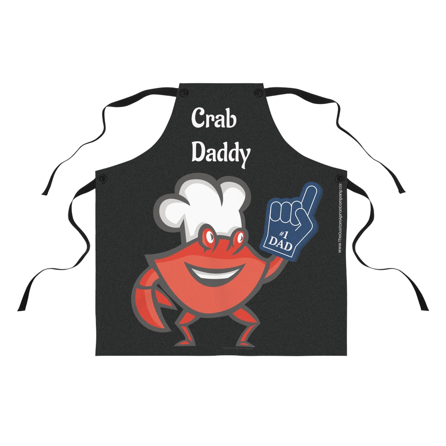 Black apron with a cartoon crab holding a blue card saying '#1 Dad' on a white background